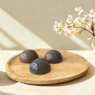 Picasso Flowers (oranje bloesem). Visser chocolade